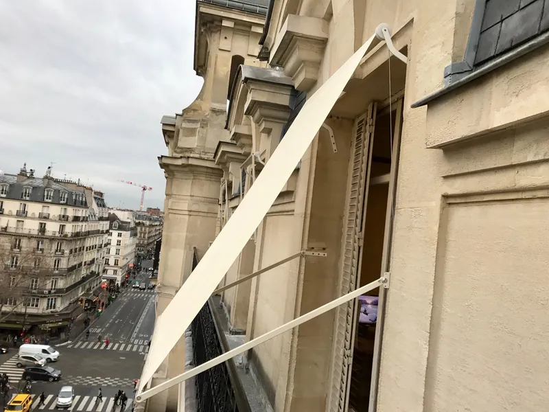 Projection awnings with “homemade” brackets